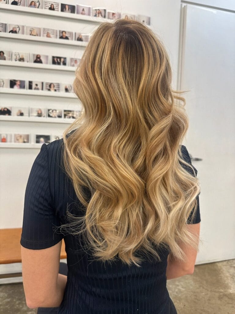 Blonde balayage Lower East Side NYC long wavy hair Color And Andy