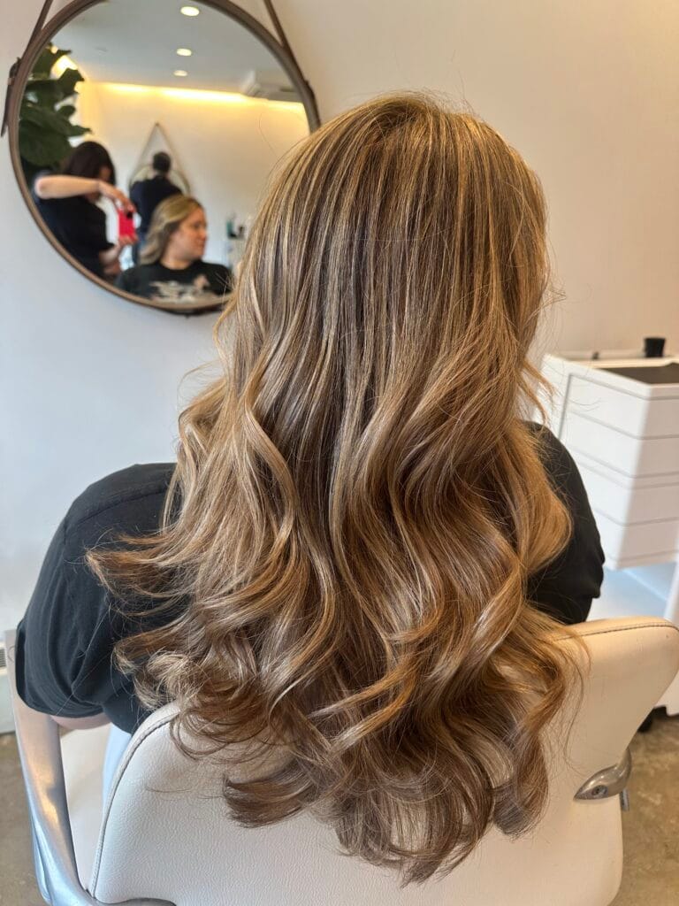 Highlights NYC long curly blonde hair Color And Andy Bowery hair salon